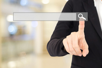 finger pointing at the search bar